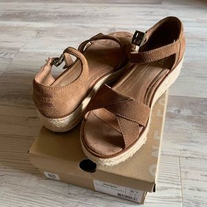 Brown suede platform Toms sandals, size 6.5